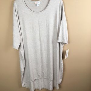 beige with multicolored threading. Style is Irma.